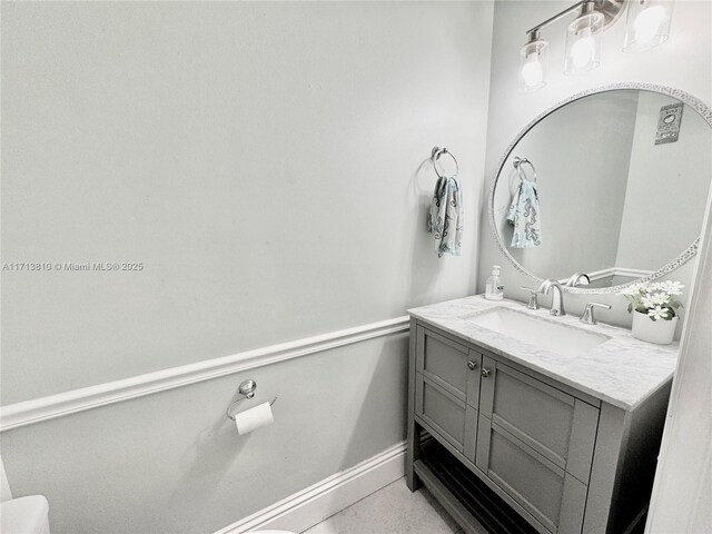 laundry area with separate washer and dryer and wood-type flooring