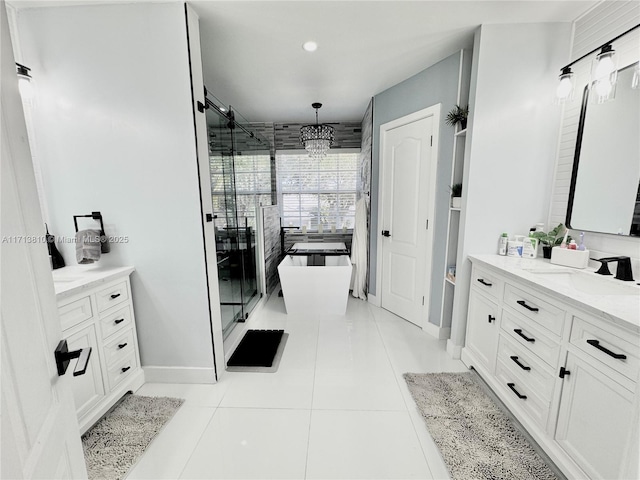 bathroom featuring a chandelier, tile patterned floors, an enclosed shower, and vanity