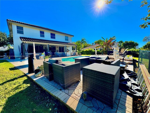 exterior space with a patio and outdoor lounge area