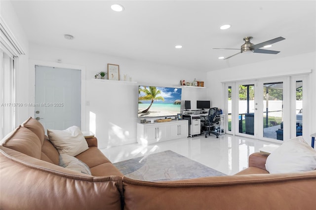 living room with ceiling fan and french doors