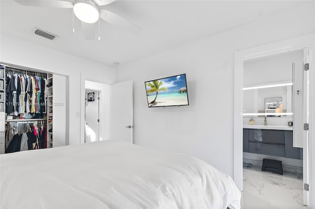 bedroom featuring a closet and ceiling fan