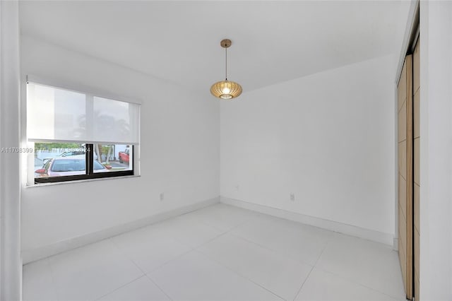 view of tiled spare room