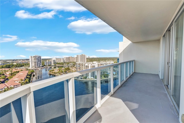 balcony featuring a water view