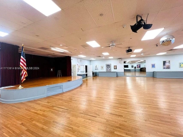 interior space with ceiling fan