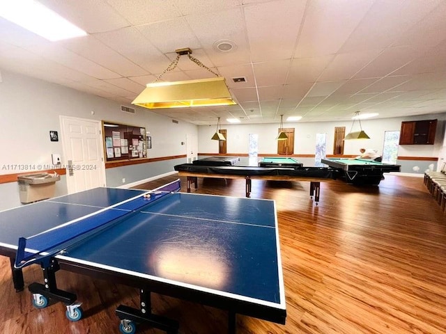 rec room with hardwood / wood-style floors and billiards