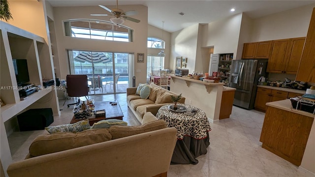 760 SW 190th Ave, Pembroke Pines, FL 33029 - living room with high vaulted ceiling, ceiling fan, recessed lighting, and light tile patterned floors
