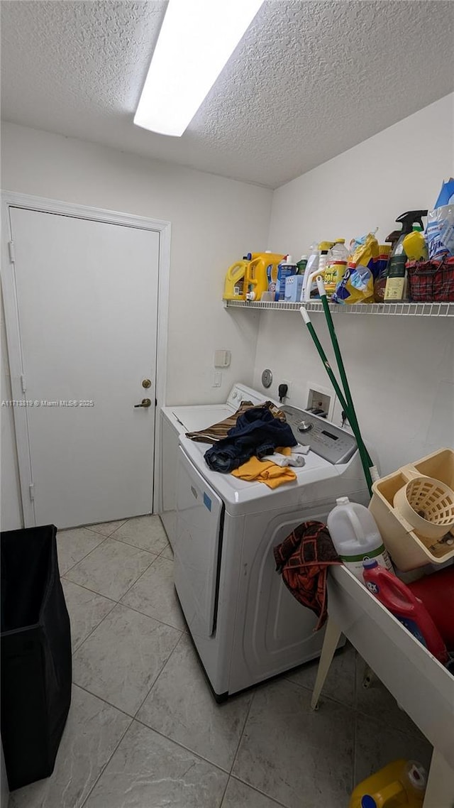760 SW 190th Ave, Pembroke Pines, FL 33029 - laundry room with separate washer and dryer, a textured ceiling, and laundry area