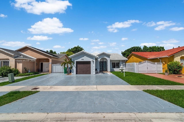 ranch-style home featuring a garage