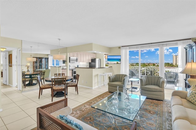 living room with light tile patterned flooring