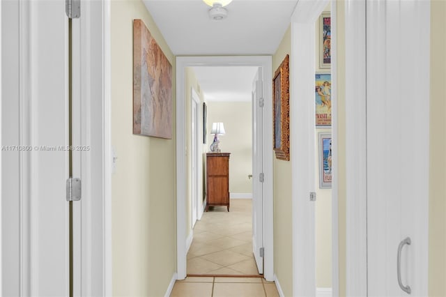 hallway with light tile patterned floors