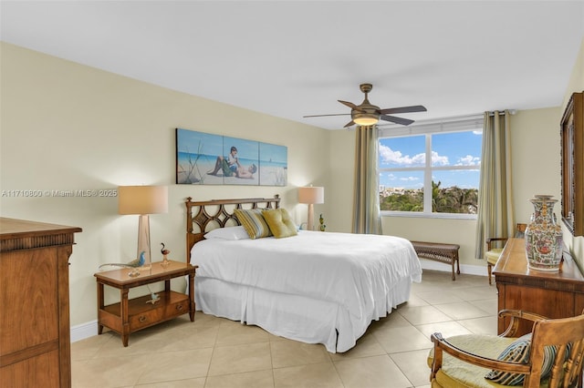 bedroom with light tile patterned floors and ceiling fan