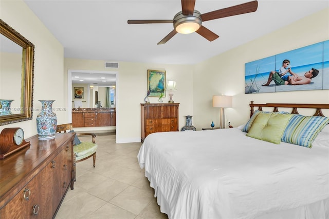 tiled bedroom featuring ceiling fan