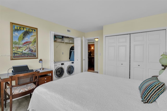 bedroom with washer and dryer