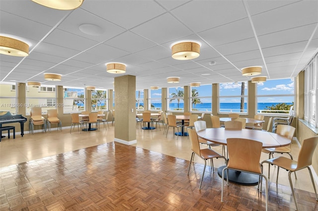 building lobby featuring a water view