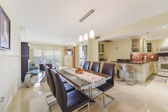 dining space with sink