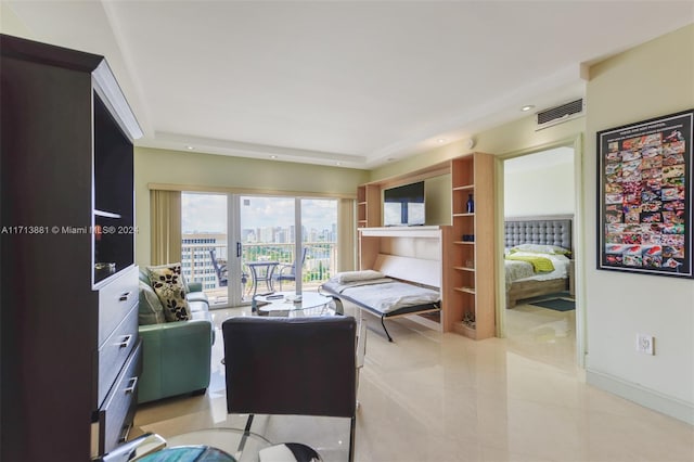 living room featuring french doors and light tile patterned floors