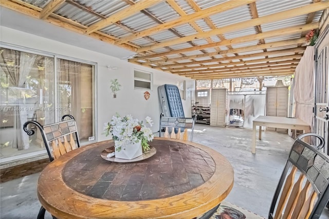 dining area with concrete floors