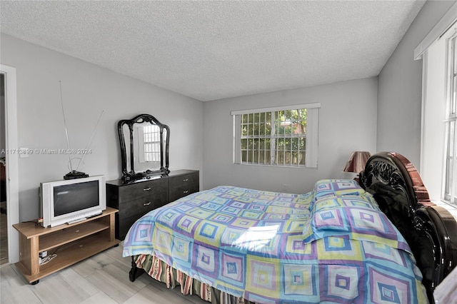 bedroom with a textured ceiling