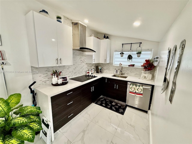 kitchen with white cabinetry, sink, wall chimney range hood, stainless steel dishwasher, and black electric stovetop