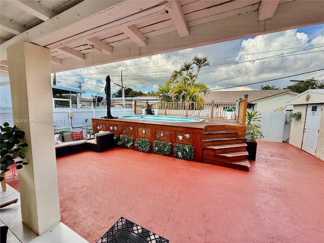 view of patio with a fenced in pool