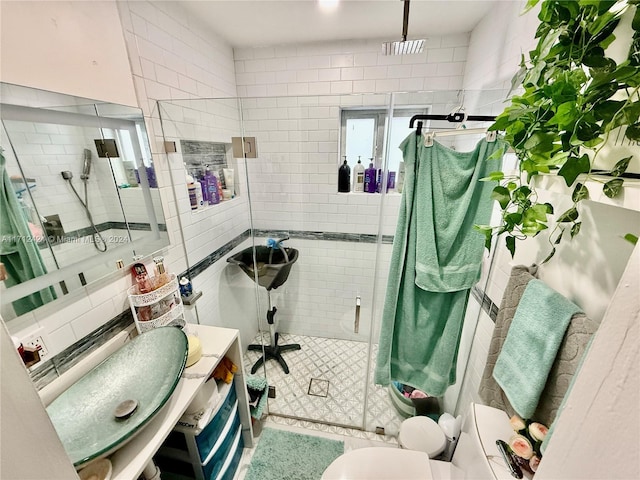 bathroom featuring an enclosed shower