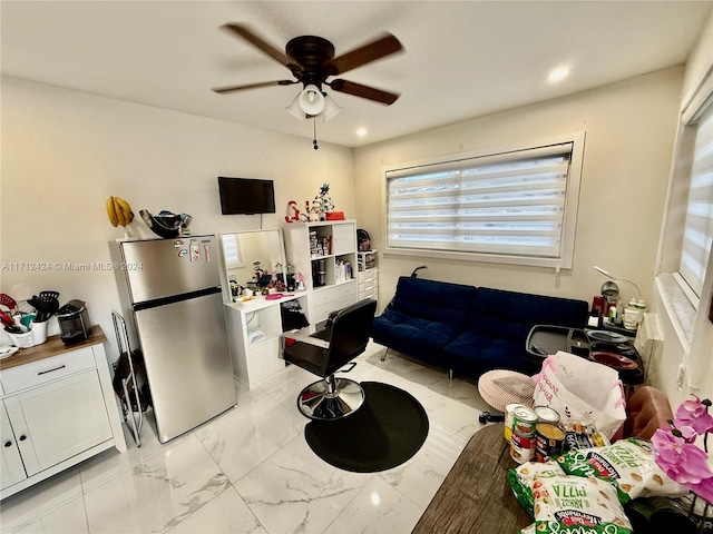 living room featuring ceiling fan