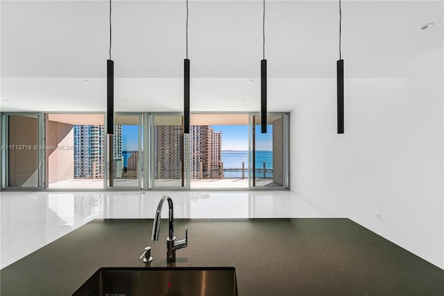 kitchen with sink and a water view