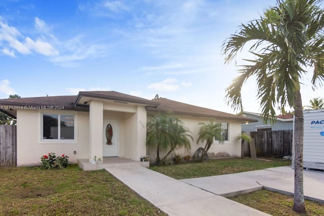 view of front of house with a front yard