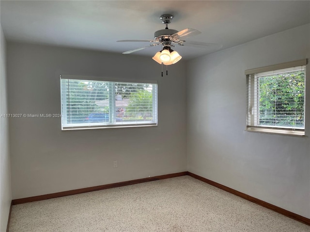 spare room featuring ceiling fan