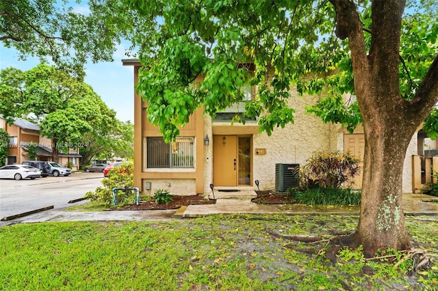 view of front of house with central AC