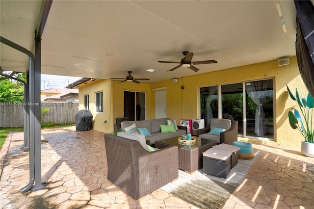 view of patio / terrace with outdoor lounge area and a grill