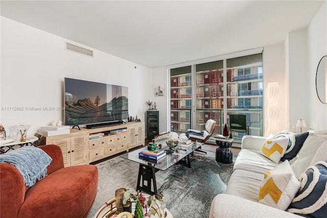 living room with floor to ceiling windows