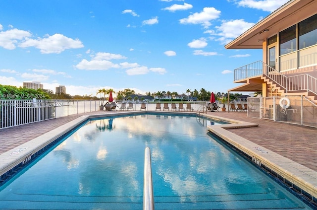 view of swimming pool featuring a patio