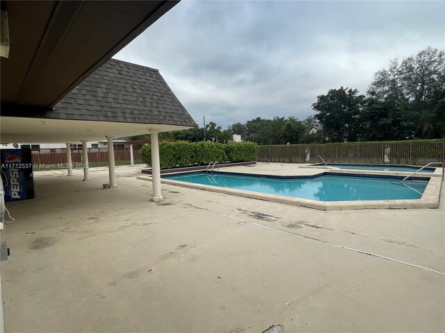 view of pool with a patio