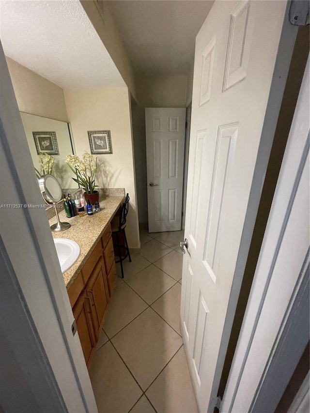 bathroom featuring vanity and tile patterned floors