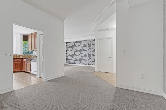 interior space featuring crown molding and light colored carpet