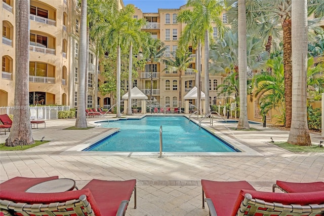 view of swimming pool with a patio area