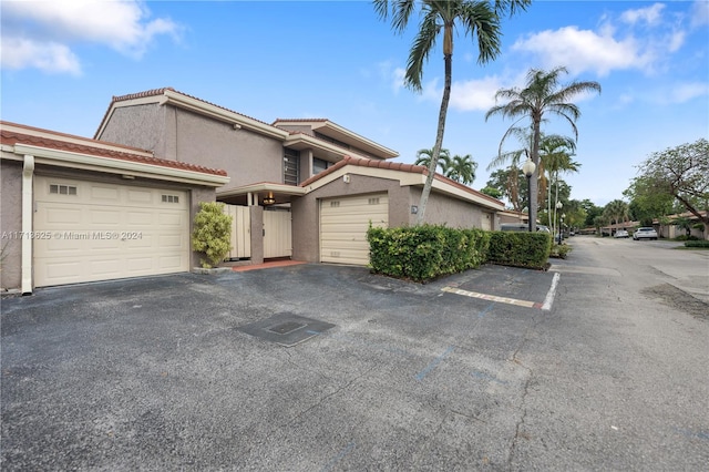 1709 Saint Andrews Rd, Hollywood, FL 33021 - view of property featuring stucco siding and a tile roof