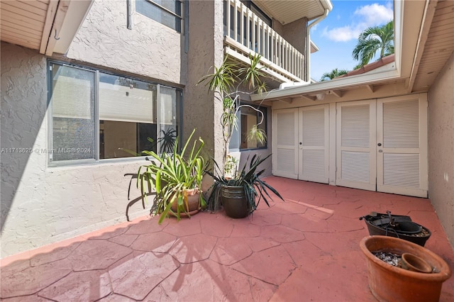 view of patio with a balcony