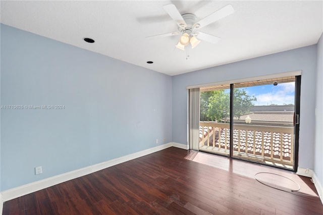 empty room with ceiling fan and wood-type flooring