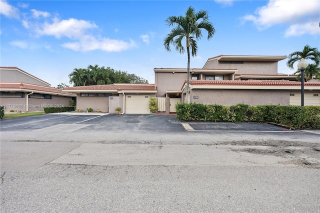 1709 Saint Andrews Rd, Hollywood, FL 33021 - multi unit property with stucco siding, uncovered parking, and a tiled roof