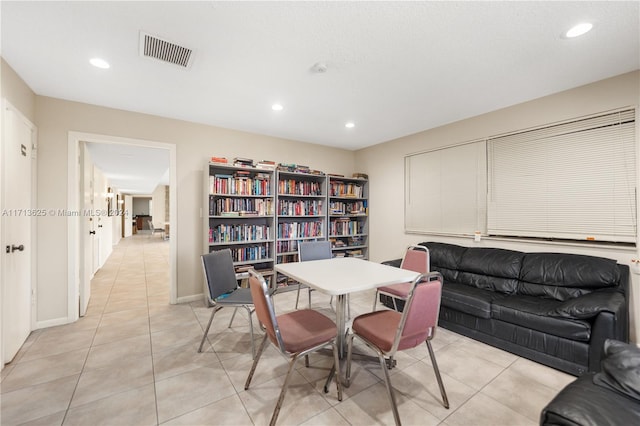 dining room with light tile patterned flooring