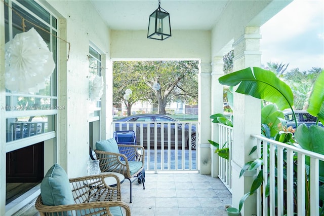 balcony featuring covered porch