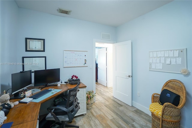 office space featuring light wood-type flooring