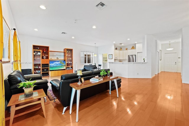 living room featuring light hardwood / wood-style flooring