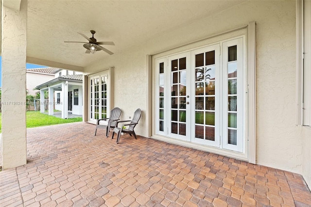 view of patio featuring french doors and ceiling fan