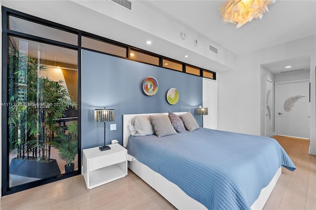 bedroom with wood-type flooring