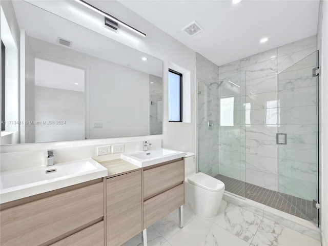 bathroom featuring an enclosed shower, vanity, and toilet