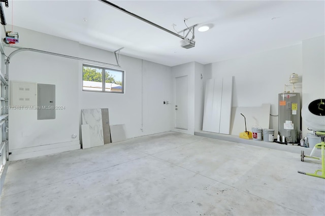 garage featuring electric panel, electric water heater, and a garage door opener