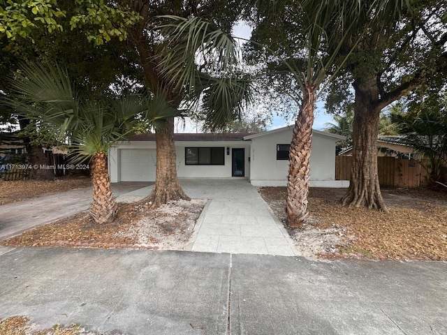 view of front of property featuring a garage